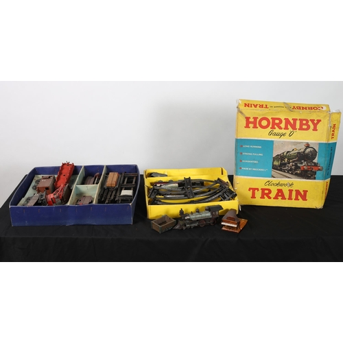 121 - A HORNBY TRAIN SET with eight tracks inscribed 'LMS' together with a part Hornby trainset with track... 