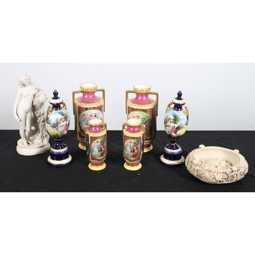 130 - A MISCELLANEOUS COLLECTION to include two pairs of Bavarian china vases, a pair of Austrian lidded u... 