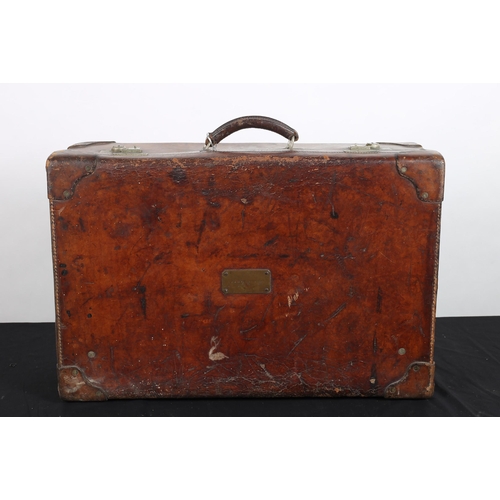 138 - A VINTAGE LEATHER SUITCASE with white metal clasps and locks 
51cm (h) x 70cm (w) x 22cm (d)