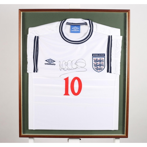 143 - A FRAMED MICHAEL OWEN ENGLISH JERSEY, SIGNED
70cm (h) x 60cm (w)