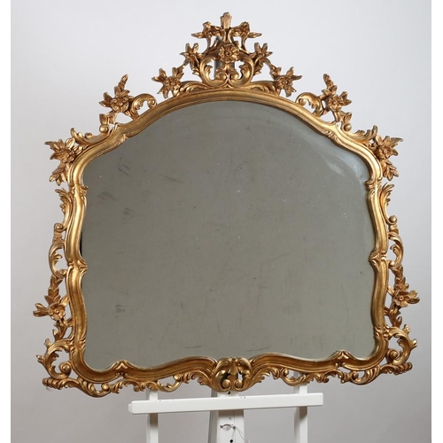 160 - A CONTINENTAL GILT FRAME MIRROR the shaped plate within a pierced flowerhead and foliate frame with ... 