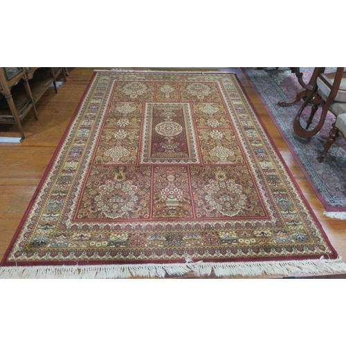 172 - A MULTICOLOURED GROUND PATTERN RUG the central panel filled with stylised flowerheads and foliage wi... 