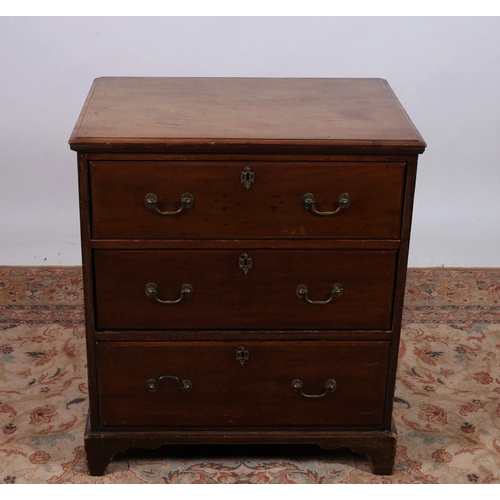 190 - A GEORGIAN MAHOGANY CHEST of rectangular outline the shaped top above three long graduated drawers w... 