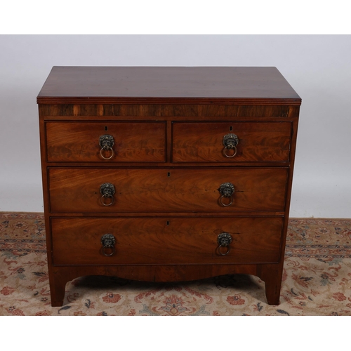 192 - A GEORGIAN MAHOGANY CHEST of rectangular outline the shaped top with reeded rim above two short and ... 