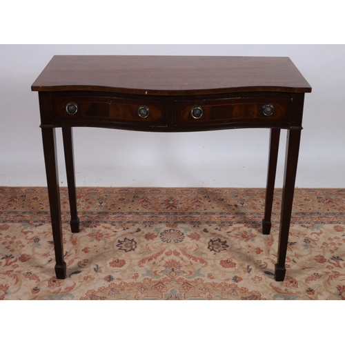 203 - A HEPPLEWHITE DESIGN MAHOGANY CROSSBANDED SIDE TABLE of serpentine outline the shaped top with two f... 