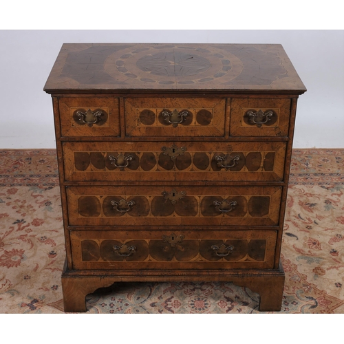 228 - A GOOD GEORGIAN DESIGN OYSTER WOOD CHEST of rectangular outline the shaped top above three short dra... 