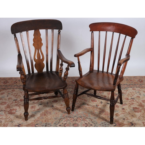 234 - TWO VINTAGE ELM WOOD WINDSOR CHAIRS each with a curved top rail and vertical splats with scroll arms... 