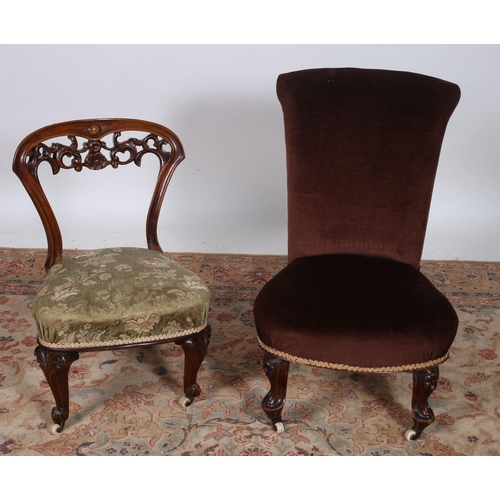 244 - A 19TH CENTURY CARVED MAHOGANY AND UPHOLSTERED OCCASIONAL CHAIR with pierced carved top rail above a... 