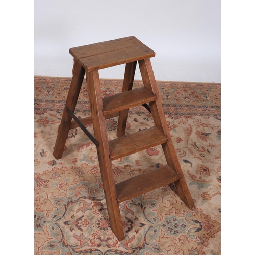 265 - A VINTAGE OAK FOUR THREAD FOLDING STEPS 
65cm (h) x 32cm (w) x 64cm (d)