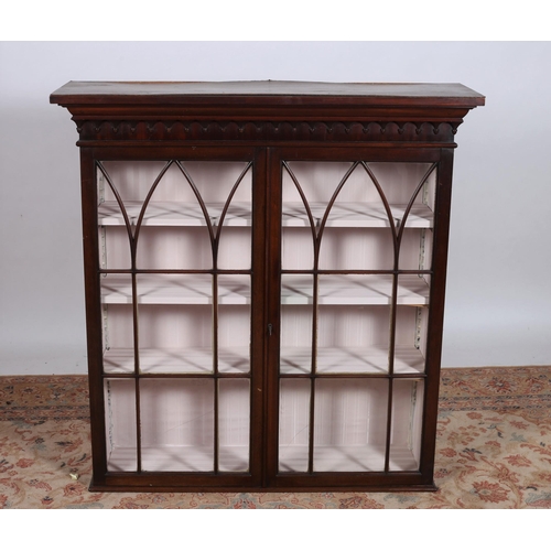 279 - A GEORGIAN MAHOGANY BOOKCASE TOP the moulded cornice above a pair of astragal glazed doors containin... 