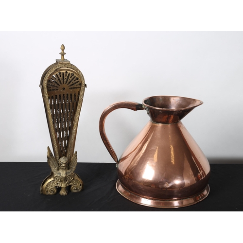 282 - A VICTORIAN COPPER MEASURE 
39cm (h)
together with A BRASS FAN FOLDING FIRESCREEN 
60cm (h) (2)