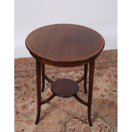 304 - AN EDWARDIAN MAHOGANY AND SATINWOOD INLAID OCCASIONAL TABLE of circular outline the shaped top on sq... 