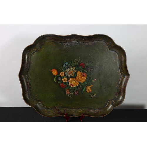 312 - A PAPIER MACHE PAINTED TRAY of rectangular shaped outline the green and gilt ground with central flo... 