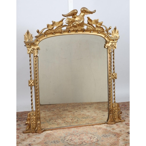 345 - A 19TH CENTURY GILTWOOD AND GESSO OVERMANTLE MIRROR the rectangular arched plate within a spiral twi... 