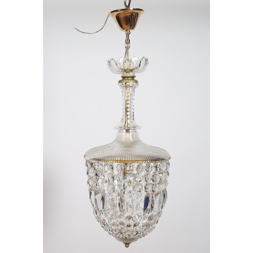 382 - A CONTINENTAL GILT BRASS AND CUT GLASS BASKET CHANDELIER hung with faceted pendants
75cm drop