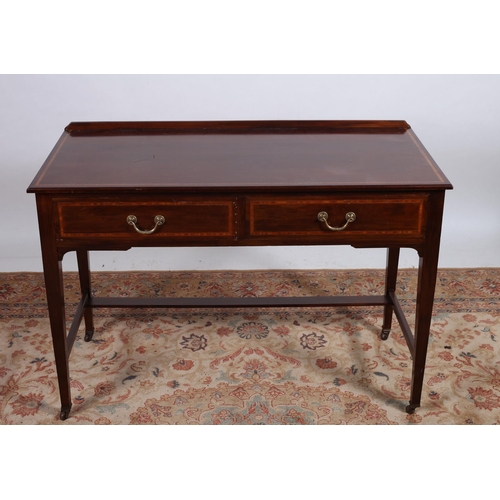 69 - A SHERATON DESIGN MAHOGANY AND SATINWOOD INLAID SIDE TABLE of rectangular outline the shaped top wit... 