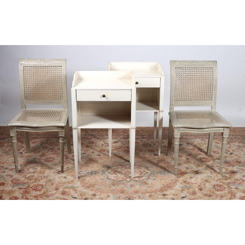 694 - A PAIR OF CONTINENTAL GREY PAINTED CHAIRS each with a bergère panel back and seat on fluted tapering... 