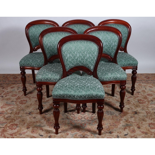 79 - A SET OF SIX VICTORIAN DESIGN MAHOGANY AND UPHOLSTERED DINING ROOM CHAIRS each with a curved top rai... 