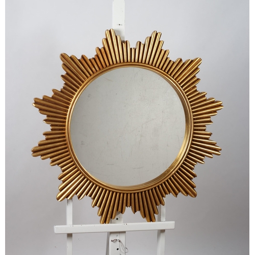 812 - A CONTINENTAL GILT FRAME SUNBURST MIRROR with circular plate 
100cm (w)