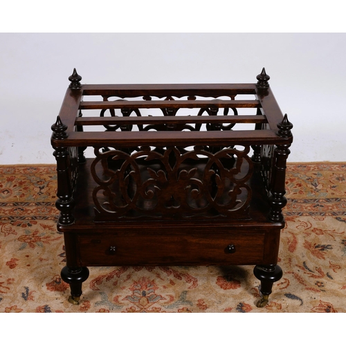 70 - A 19TH CENTURY MAHOGANY TWO DIVISION CANTERBURY with pierced fretwork frieze between baluster uprigh... 