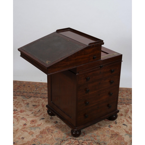 90 - A 19TH CENTURY MAHOGANY DAVENPORT with moulded three quarter gallery the sliding tooled leather hing... 