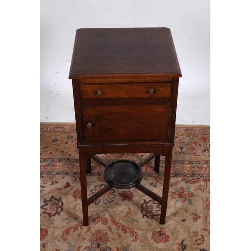 97 - A 19TH CENTURY MAHOGANY POT CUPBOARD of rectangular outline the shaped top above a frieze drawer and... 