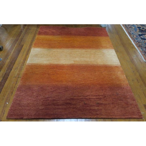 149 - A GABBEH WOOL RUG the multicolour ground with irregular pattern 
240cm (l) x 172cm (w)