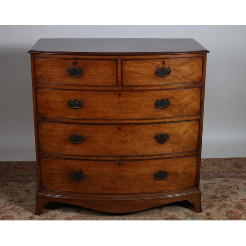 180 - A 19TH CENTURY MAHOGANY CHEST of demi lune outline the shaped top above two short and three long gra... 