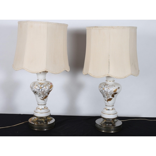 226 - A PAIR OF VINTAGE OPALINE GLASS TABLE LAMPS each of urn form decorated with flowerheads and foliage ... 