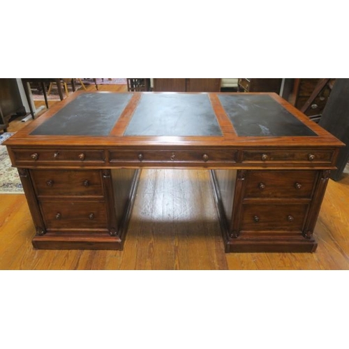 281 - A 19TH CENTURY MAHOGANY PARTNER'S PEDESTAL DESK of rectangular outline the shaped top with leather w... 