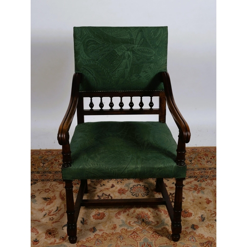 285 - A 19TH CENTURY GOTHIC DESIGN ELBOW CHAIR the rectangular upholstered back and seat with spindle spla... 