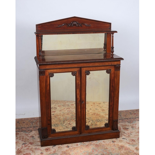 369 - A REGENCY MAHOGANY SIDE CABINET the superstructure with moulded shelf and mirrored back above a rect... 