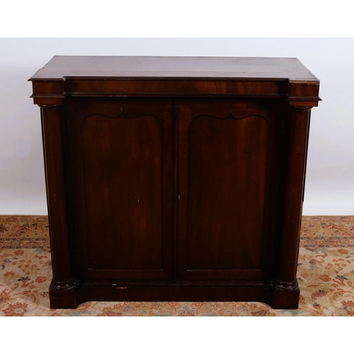 372 - A 19TH CENTURY MAHOGANY SIDE CABINET of inverted breakfront outline the shaped top above a pair of c... 