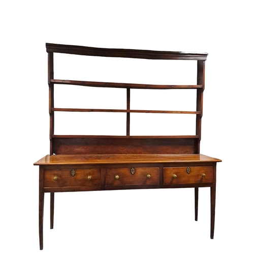 374 - AN 18TH CENTURY ELM AND OAK WELSH  DRESSER the moulded cornice above three open shelves the base con... 