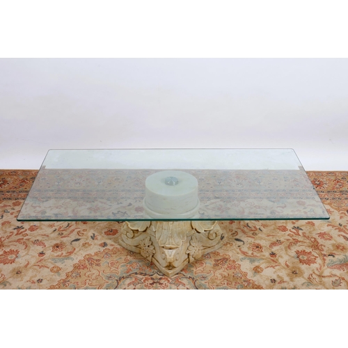 450 - A CONTEMPORARY COFFEE TABLE of rectangular outline the glazed bevelled top plate raised on a composi... 