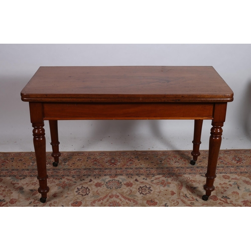 624 - A 19TH CENTURY MAHOGANY FOLDOVER SUPPER TABLE of rectangular outline the hinged top above a moulded ... 