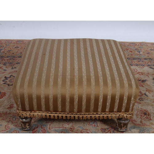 766 - A 19TH CENTURY GILTWOOD AND UPHOLSTERED STOOL the square upholstered seat on baluster legs
25cm (h) ... 