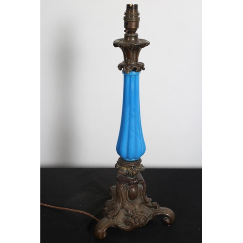104 - A 19TH CENTURY BRASS AND TURQUOISE GLASS TABLE LAMP the reeded baluster column on triform base with ... 