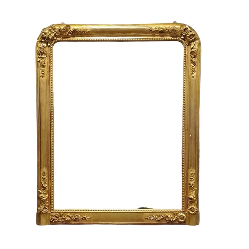 131 - A CONTINENTAL GILTWOOD AND GESSO OVERMANTEL MIRROR the rectangular plate within a beadwork foliate a... 