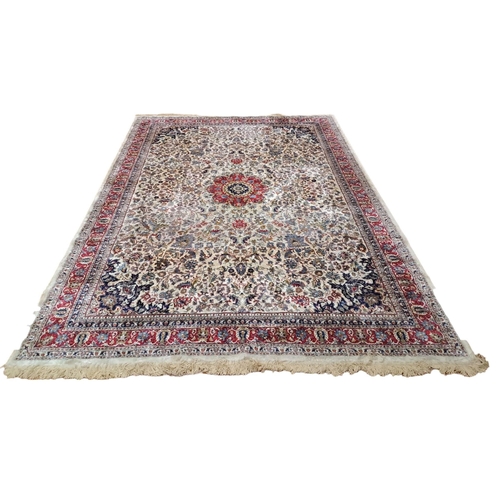 144 - A BEIGE GROUND PATTERN RUG the central floral panel within a conforming border 
327cm (l) x 233cm (w... 