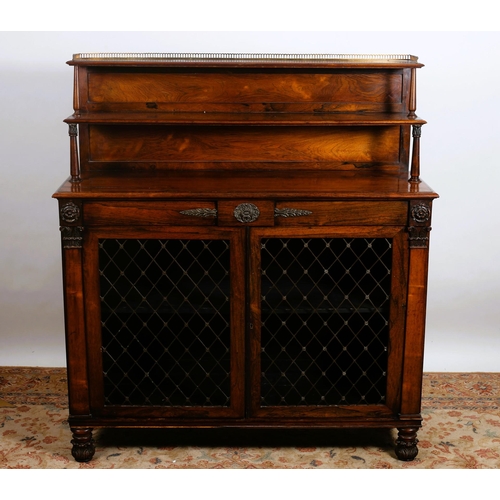 167 - A REGENCY ROSEWOOD SIDE CABINET the superstructure with open shelves and pierced brass gallery above... 