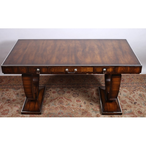 168 - AN ART DECO DESIGN WALNUT CONSOLE TABLE by Theodore Alexander of rectangular outline the shaped top ... 