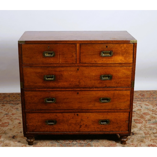 175 - A GEORGIAN MAHOGANY AND BRASS BOUND MILITARY CHEST ON CHEST of rectangular outline the shaped top ab... 