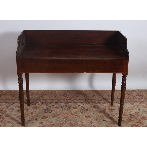 176 - A 19TH CENTURY MAHOGANY SIDE TABLE of rectangular outline the shaped top with moulded three quarter ... 