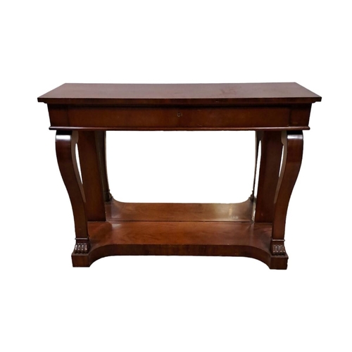 178 - A REGENCY DESIGN MAHOGANY CONSOLE TABLE of rectangular outline the shaped top with frieze drawer rai... 