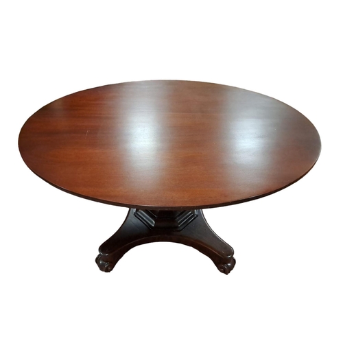 179 - A 19TH CENTURY MAHOGANY POD TABLE of oval outline the shaped top above a baluster column on a shaped... 