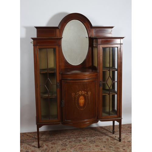 196 - A VINTAGE MAHOGANY AND SATINWOOD INLAID CHINA DISPLAY CABINET of rectangular bowed outline the super... 