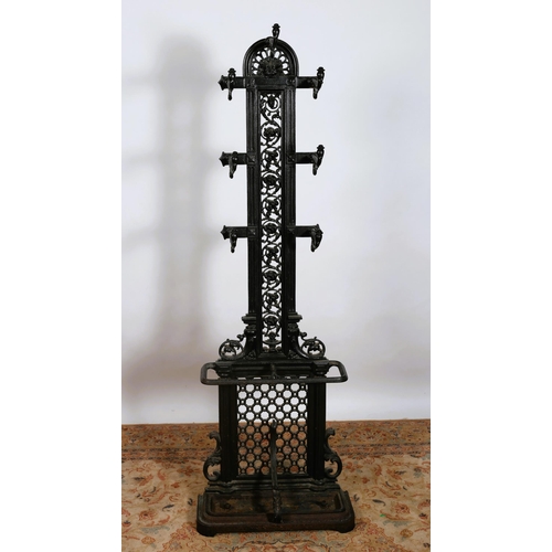 199 - A 19TH CENTURY COALBROOKDALE CAST IRON HAT COAT AND STICK STAND of rectangular arched form with figu... 