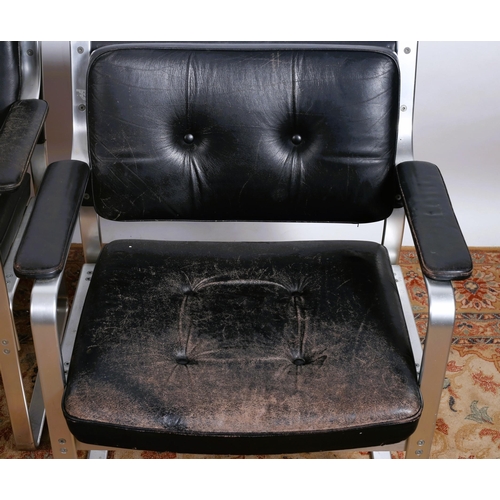 211 - A PAIR OF KARL EKSELIUS 'MONDO' BLACK LEATHER ARMCHAIRS  H 80cm x W68cm x D 64cm, Seat Height 45 cm ... 