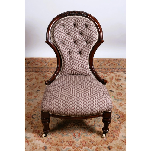 213 - A 19TH CENTURY CARVED MAHOGANY AND UPHOLSTERED LADIES CHAIR the shaped top rail above a buttoned uph... 